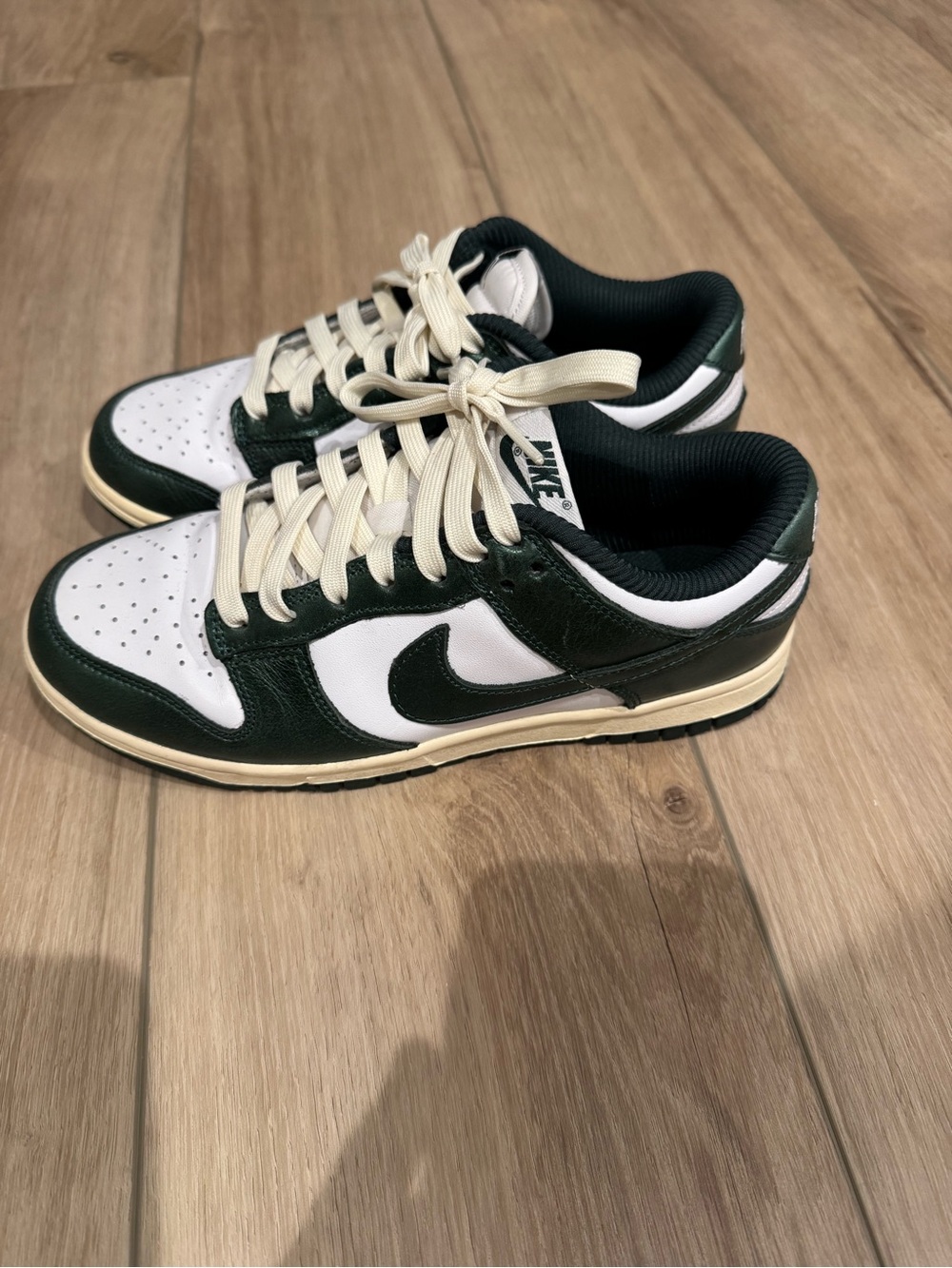 Nike women’s Sneakers in White and Dark Green with Cream Accents